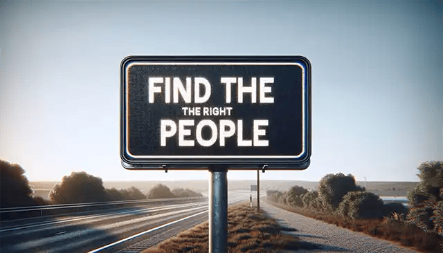 A road sign prominently positioned on the side of a highway saying find the right people
