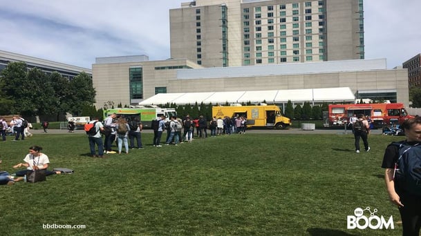 Adam Lewis BBD Boom - Yellow food truck with a long queue