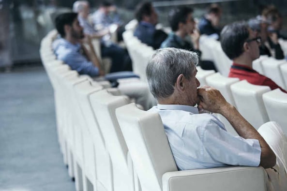 Audience wathcing a conference