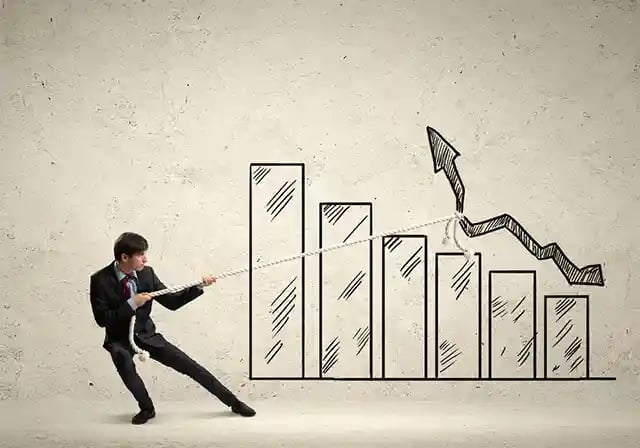 Image of young businessman pulling graph. Chart growth concept