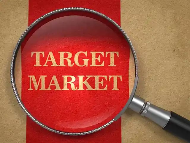 Target Market - Magnifying Glass on Old Paper with Red Vertical Line