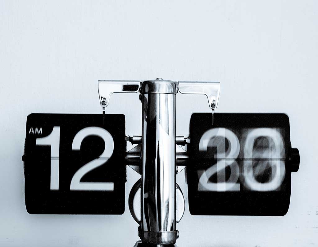 Vintage clock showing time to publish online content