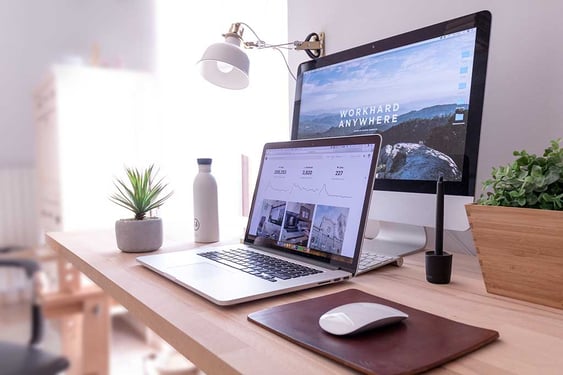 two computer on a desk; seo and website