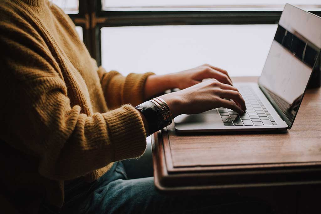 person using laptop